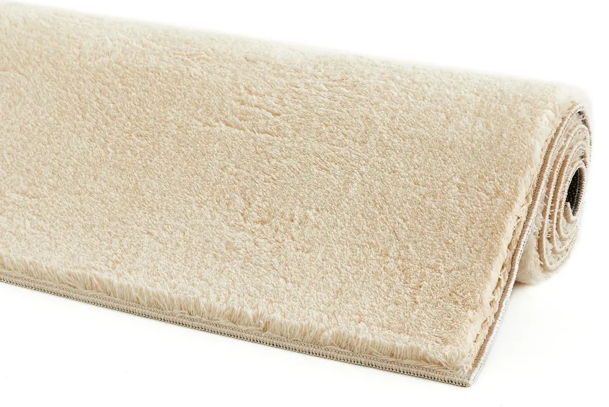 Flauschiger Teppich creme
