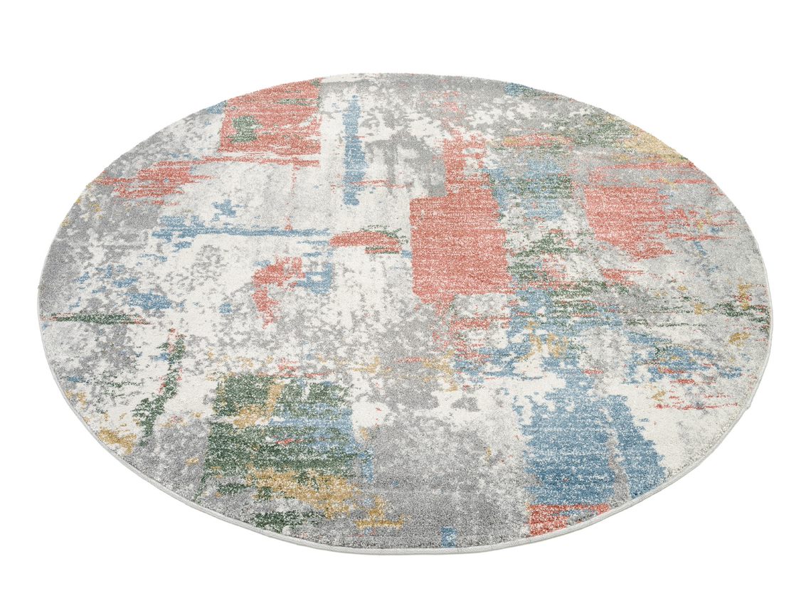 runder Teppich in pastel Farbtönen